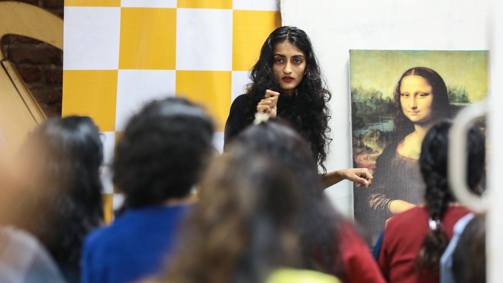 A diverse group of participants engaged in an art workshop, showcasing inclusive creative expression and community building through artistic activities